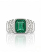 Geometric men’s emerald ring with angular diamond accents and refined platinum shield design | SARATTI