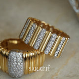 Gold statement ring with vertical ridges and pavé diamond bar, refined modern design | SARATTI