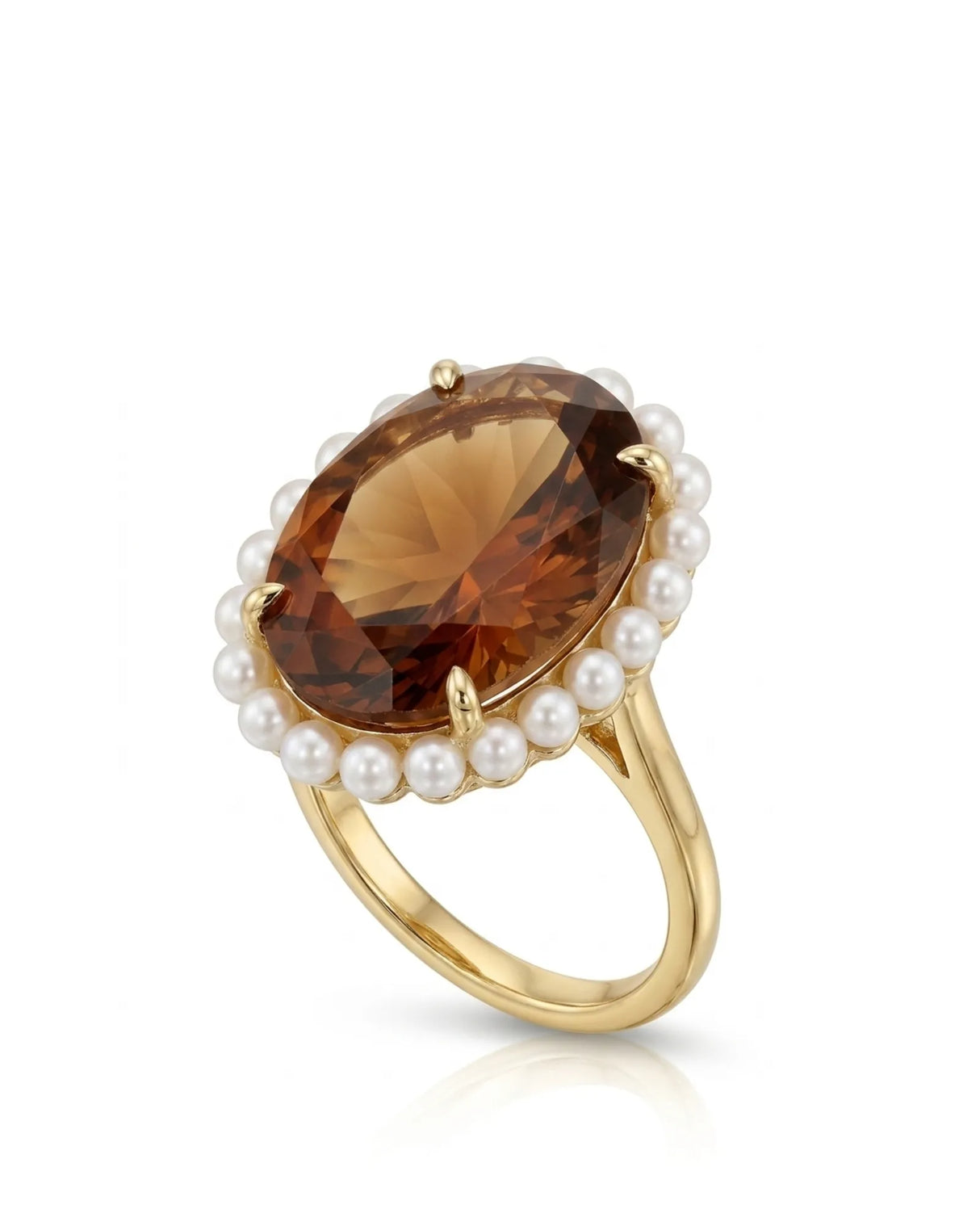 Golden oval Imperial Topaz ring encircled by round pearls in polished 18K yellow gold | SARATTI