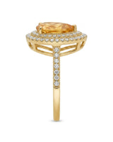 Golden pear-cut citrine surrounded by brilliant diamond halos in a polished 18K yellow gold ring - SARATTI