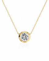 SOLARA Bezel-Set Round Cut solitaire necklace setting in yellow gold, front view | SARATTI