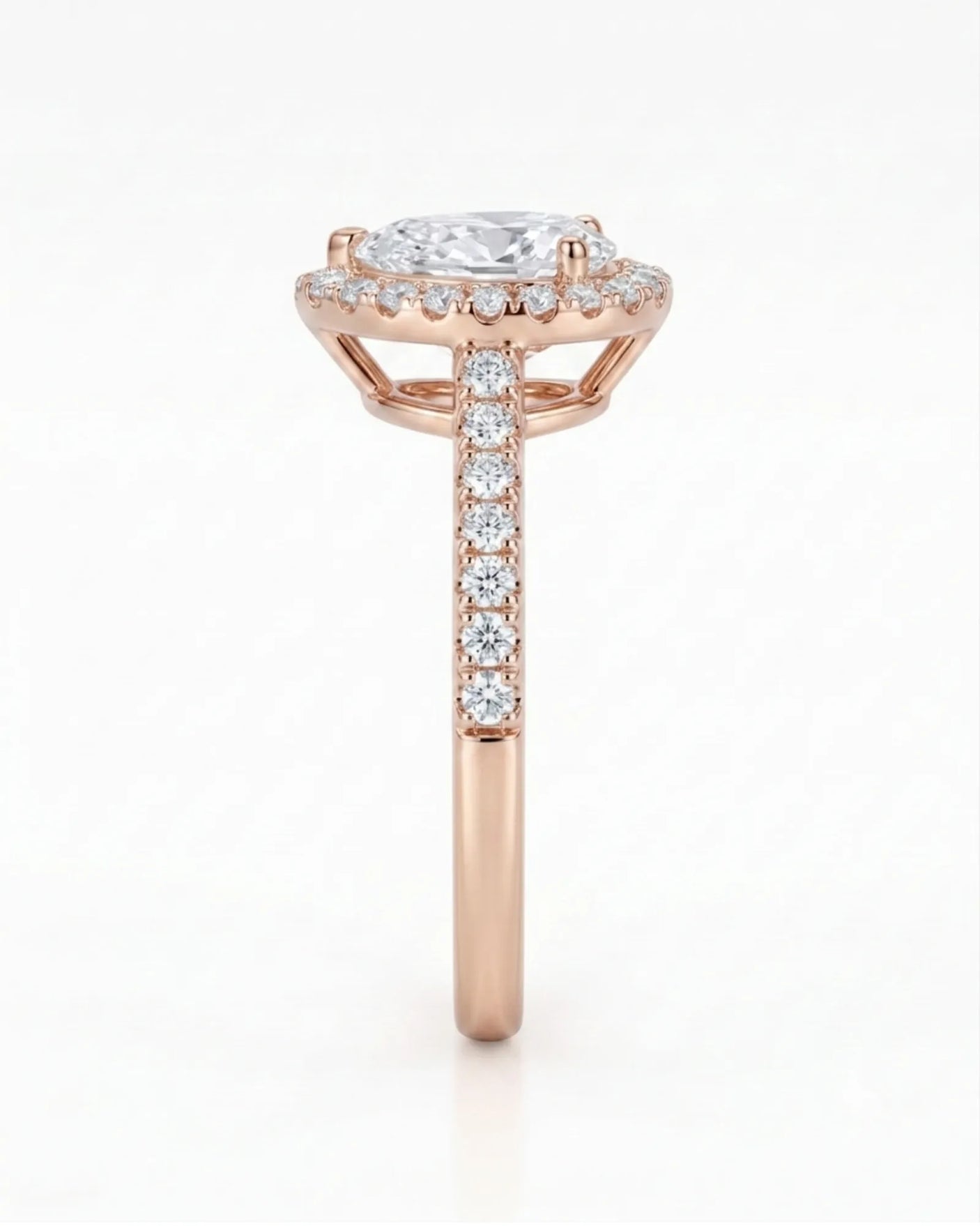 Graceful teardrop moissanite ring with scalloped halo and raised gallery in 18K rose gold | SARATTI
