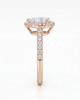 Graceful teardrop moissanite ring with scalloped halo and raised gallery in 18K rose gold | SARATTI