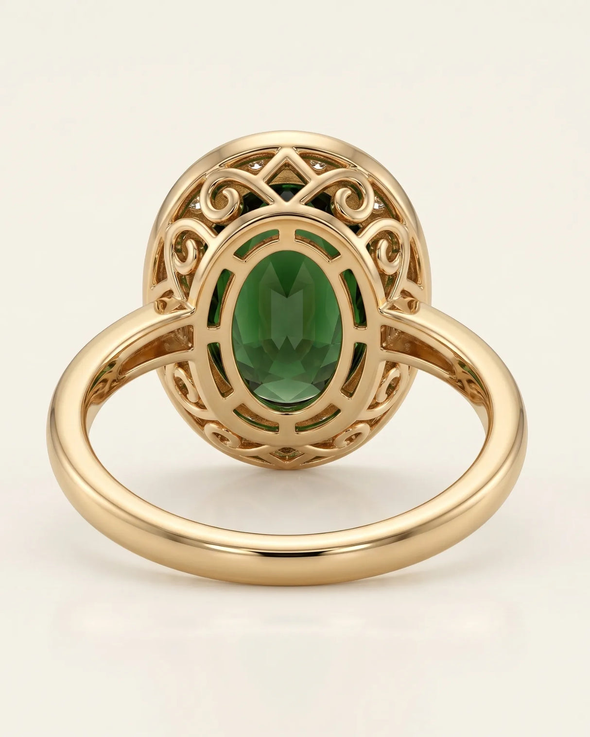 Green tourmaline engagement ring with diamond halo in 18K yellow gold | SARATTI