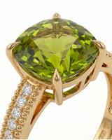 Green tourmaline engagement ring with diamond shoulders in elegant 18K Yellow Gold | SARATTI