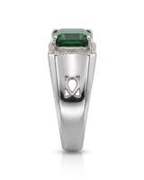 Green tourmaline engagement ring with emerald-cut center stone and diamond shoulders in polished platinum | SARATTI