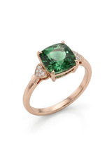 Green tourmaline ring with cushion-cut center stone and heart diamond accents in 18K rose gold | SARATTI