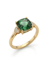 Green tourmaline ring with cushion-cut center stone and heart diamond accents in 18K yellow gold | SARATTI
