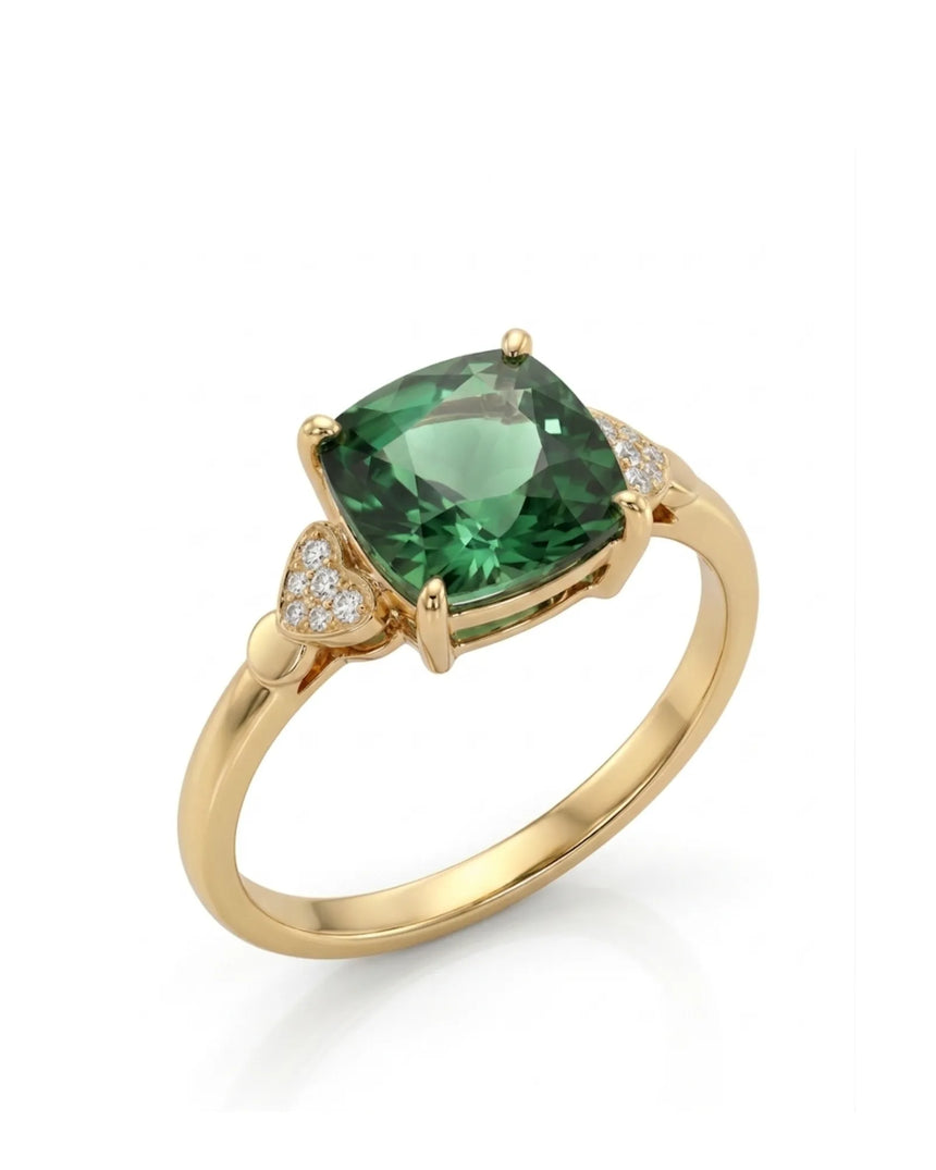 Green tourmaline ring with cushion-cut center stone and heart diamond accents in 18K yellow gold | SARATTI