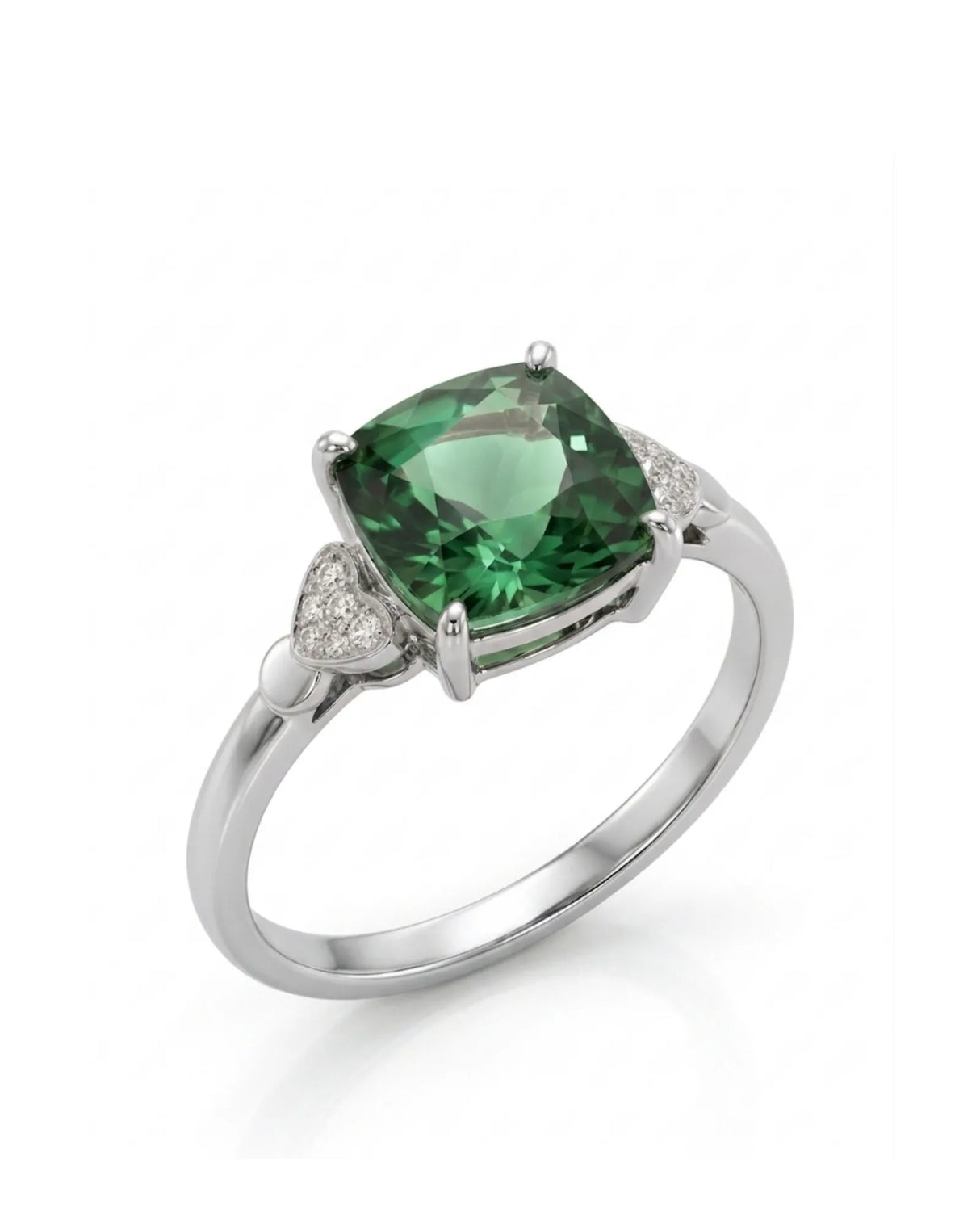 Green tourmaline ring with cushion-cut center stone and heart diamond accents in polished platinum | SARATTI