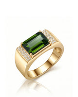 Green tourmaline ring with emerald-cut center stone and diamond side panels in 18K yellow gold | SARATTI