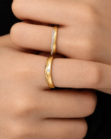 Half eternity diamond bands with brilliant accents and clean contemporary lines in warm 18K yellow gold | SARATTI