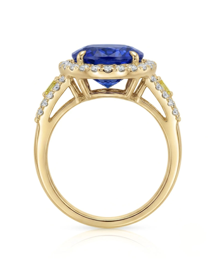 Halo sapphire ring with split shank diamonds and fancy yellow accents in 18K yellow gold | SARATTI