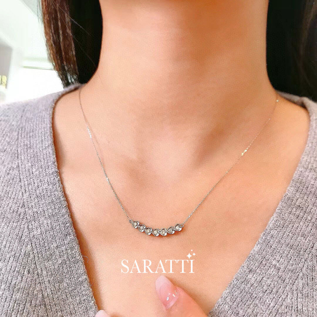 Model wears the Coeurs Enchainés Diamond Necklace for Women | Saratti 