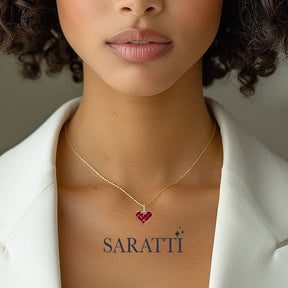 Model sports the Alma Rosa Ruby Heart Necklace | Saratti Fine Jewelry 
