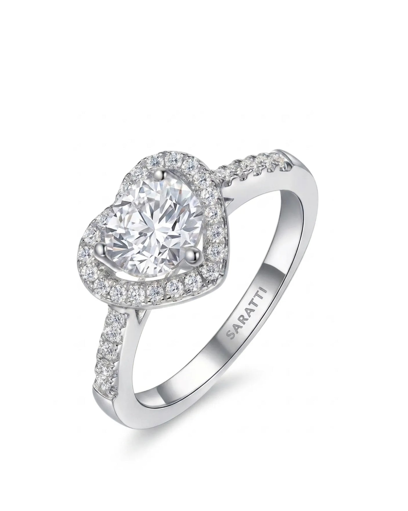 Heart-shaped moissanite engagement ring with halo accents and pavé shoulders in polished platinum | SARATTI