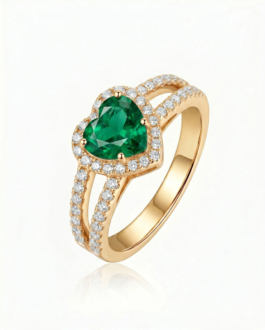 Heart halo emerald split shank ring in 18K yellow gold | SARATTI
