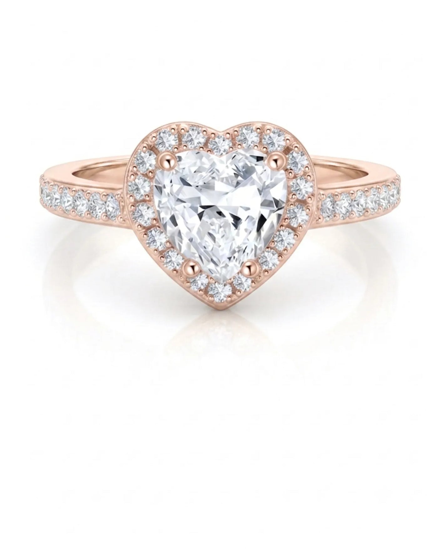 Heart moissanite center stone ring with soft rose gold and halo sparkle | SARATTI
