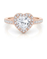 Heart moissanite center stone ring with soft rose gold and halo sparkle | SARATTI