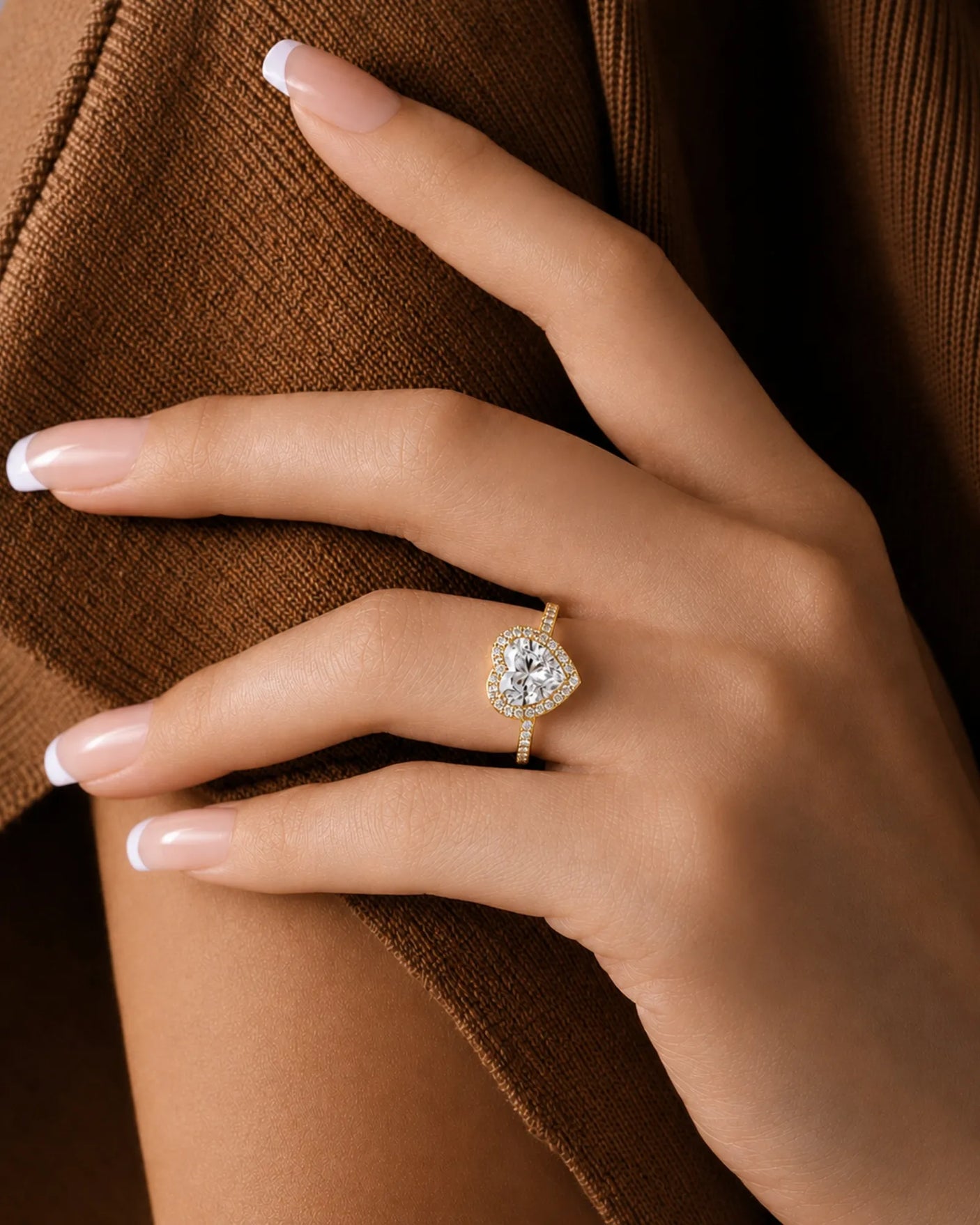 Heart moissanite center stone ring with warm yellow gold and halo sparkle | SARATTI