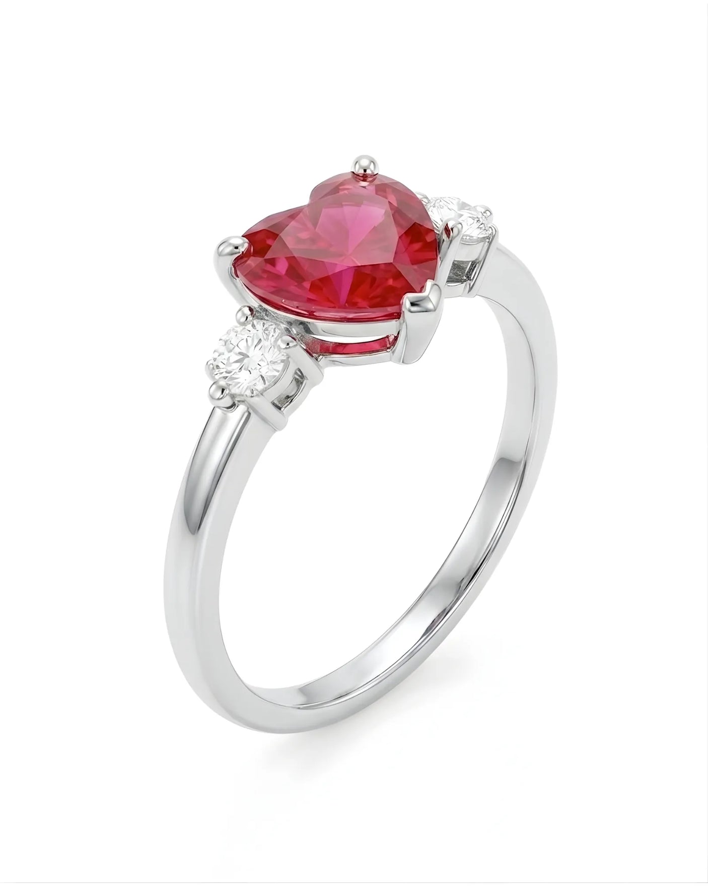 Heart ruby and diamond three-stone ring with round accents in Platinum - SARATTI