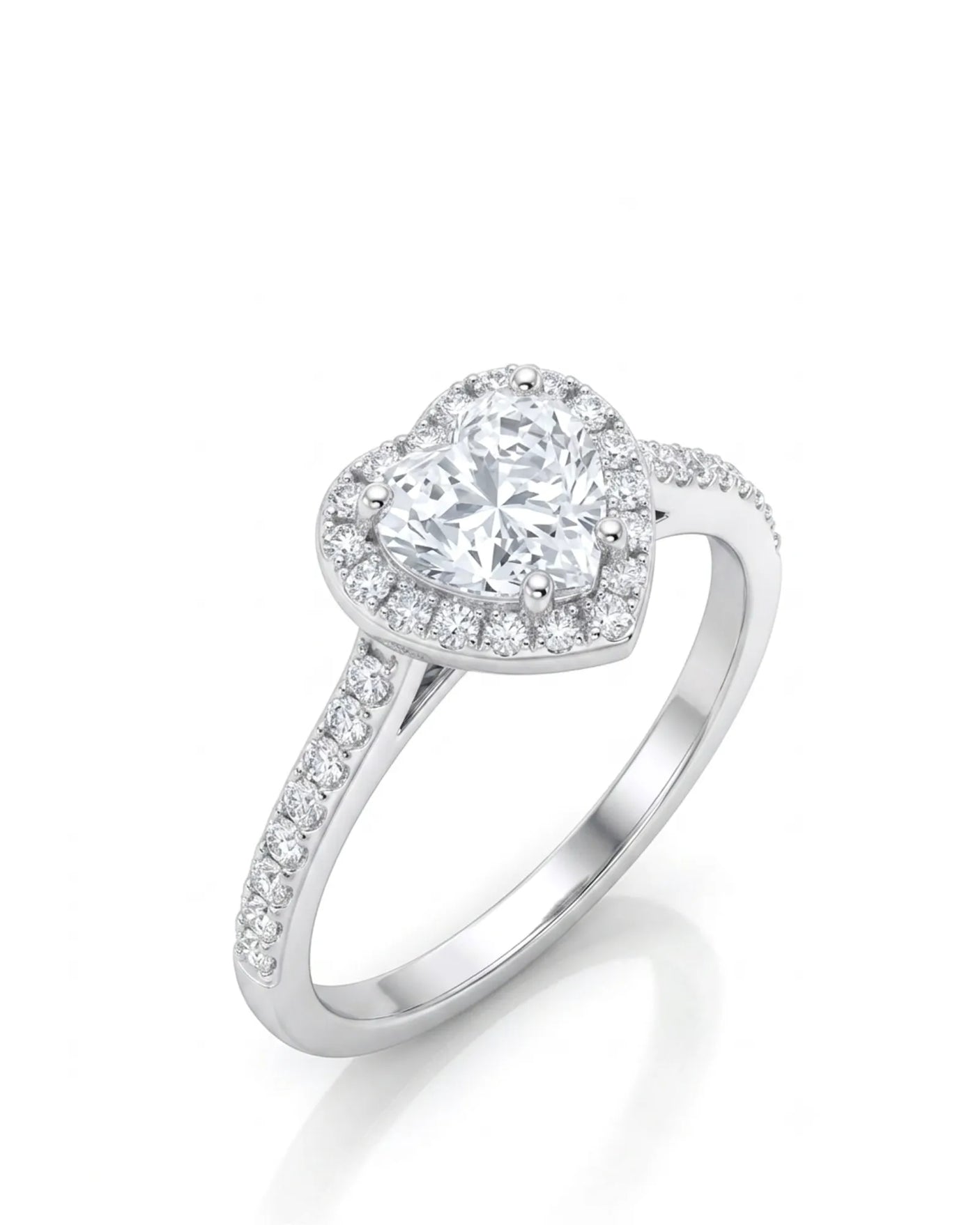 Heart shaped moissanite engagement ring with halo and pavé band in platinum | SARATTI