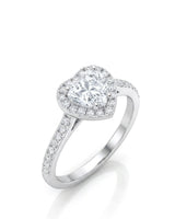 Heart shaped moissanite engagement ring with halo and pavé band in white gold | SARATTI