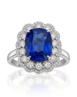 Heirloom sapphire ring with double diamond halo design in refined platinum | SARATTI