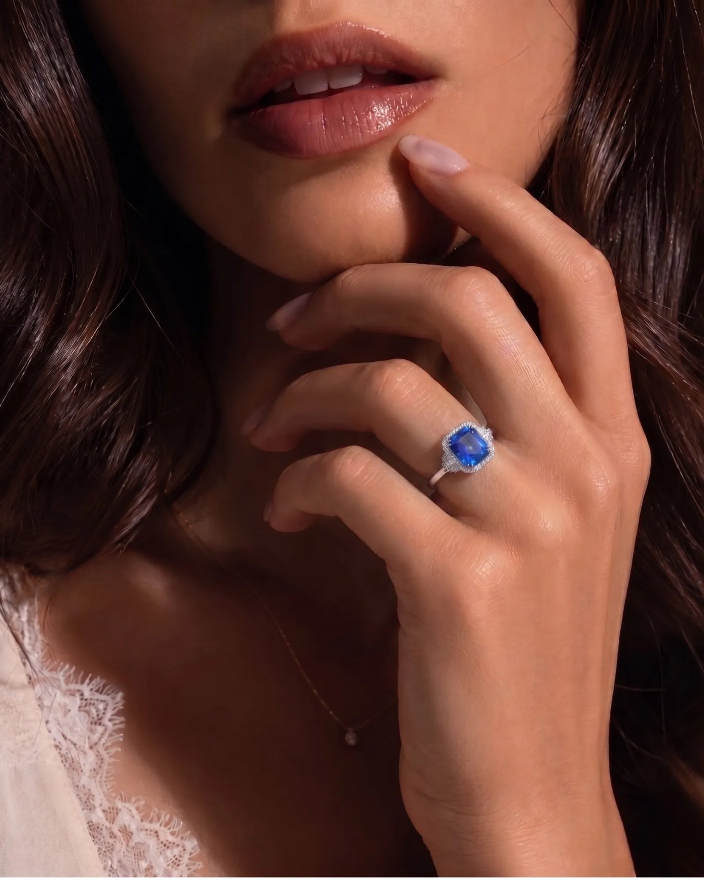 Heirloom sapphire ring with geometric diamond halo and white gold architectural setting | SARATTI