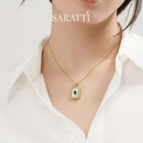 Heritage Bloom emerald pendant necklace in yellow gold tone | SARATTI
