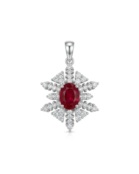 ISADORA snowflake pendant brooch with oval pigeon blood ruby and radiating diamond clusters in 18K gold | SARATTI