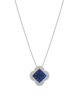 ISOLDE sapphire diamond pendant necklace with geometric blue sapphire centre and four-lobed 18K gold frame | SARATTI
