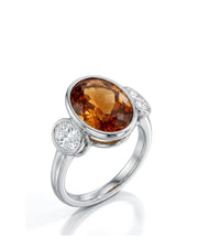 Imperial Topaz Three-Stone Bezel Setting in white gold