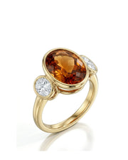 Imperial Topaz Three-Stone Bezel Setting in yellow gold | SARATTI
