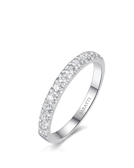 Infinity diamond wedding band with flowing diamond accents crafted in polished 18K white gold | SARATTI