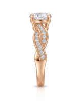 Intertwined moissanite ring with flowing pavé bands and round center stone in 18K rose gold | SARATTI
