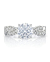 Intertwined moissanite ring with flowing pavé bands and round center stone in 18K white gold | SARATTI