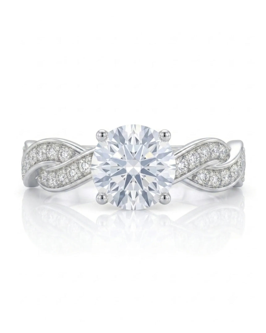 Intertwined moissanite ring with flowing pavé bands and round center stone in 18K white gold | SARATTI