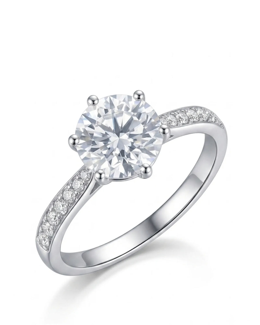Janya round brilliant diamond engagement ring with pavé side diamonds in polished 18K white gold | SARATTI