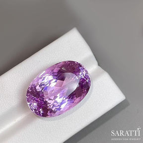 Natural Kunzite in Light Purplish Tone in Oval Shape weighing 34.66 carats | Saratti Gems