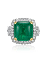 Large green sugar emerald cushion ring surrounded by 0.91ct diamonds in 18K gold | SARATTI