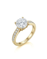 Layla round centre stone engagement ring 45-degree view with diamond-set shoulders in 18K yellow gold | SARATTI