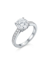 Layla round centre stone engagement ring 45-degree view with diamond-set shoulders in Platinum | SARATTI