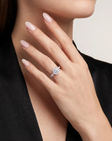 Layla round centre stone engagement ring front view with pavé diamond shoulders in 18K white gold | SARATTI