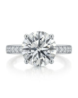 Layla round centre stone engagement ring front view with pavé diamond shoulders in Platinum | SARATTI