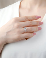Layla round centre stone engagement ring model hand view in 18K rose gold | SARATTI