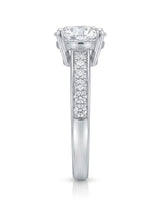 Layla round engagement ring side view showing pavé-set shoulder detail in 18K white gold | SARATTI