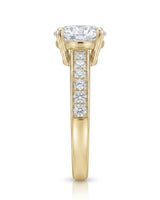 Layla round engagement ring side view showing pavé-set shoulder detail in 18K yellow gold | SARATTI