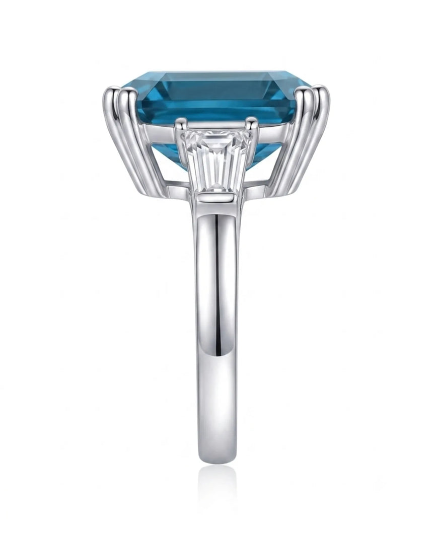London Blue topaz and diamond engagement ring with clean three-stone symmetry in 18K white gold | SARATTI