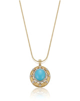 Luxury 18K gold turquoise pendant with artisan texture, diamond framing and heritage-inspired medallion design | SARATTI